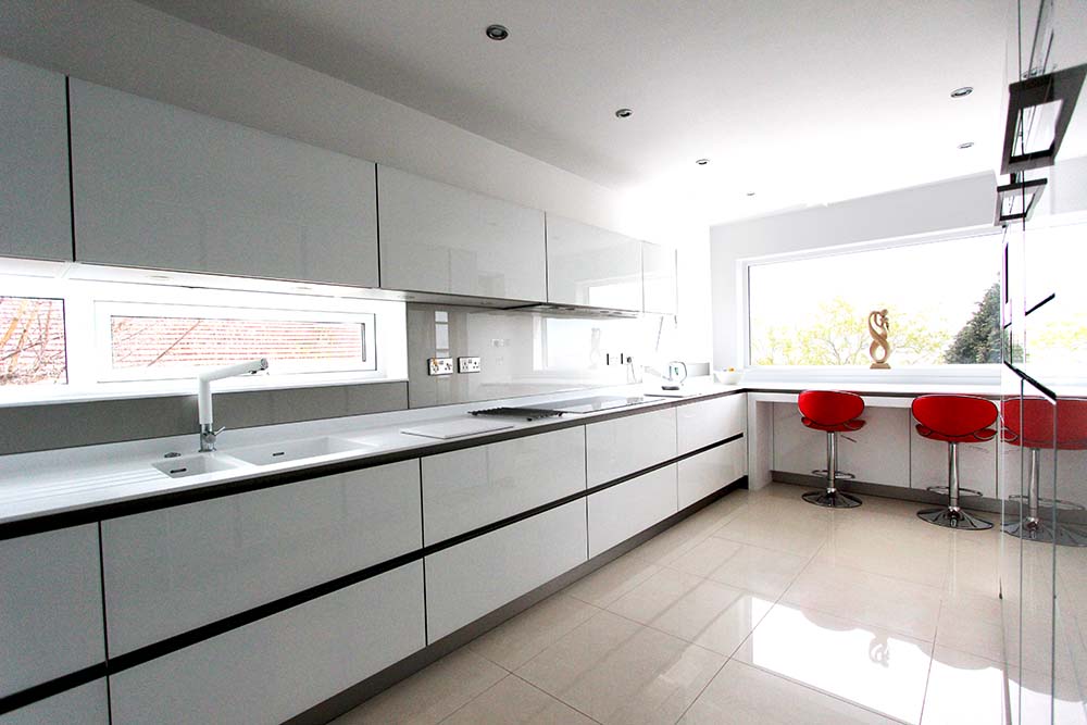 Next125 White Gloss Glassline Handle-less German Kitchen in Heswall, Wirral