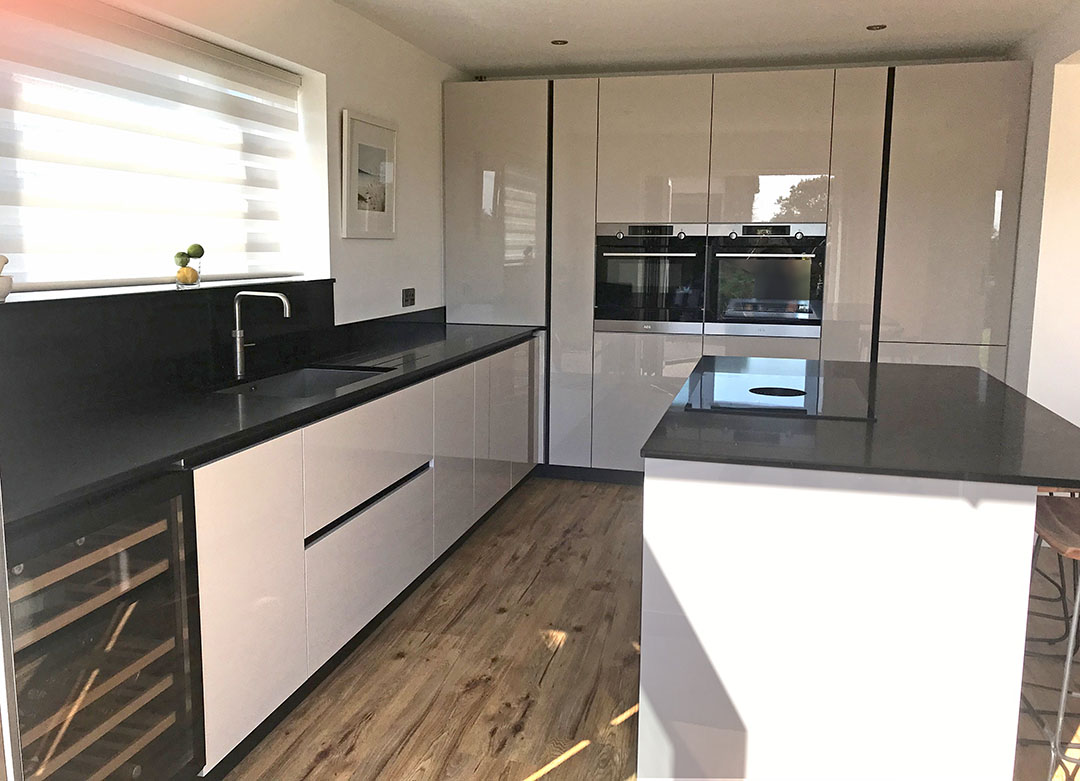 Schuller Fino German kitchen installation in Sand Grey